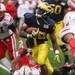 Fitzgerald Toussaint runs through defenders as the University of Michigan took on Nebraska at Michigan Stadium Saturday November 19, 2011. Jeff Sainlar I AnnArbor.com
