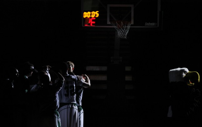 The Eastern Michigan basketball team and Swoop the mascot prepare for the start of the game as Eastern Michigan University took on Rochester College at the Convocation Center Wednesday November 23, 2011.EMU won the game 62-43. Jeff Sainlar I AnnArbor.com