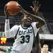 Anthony Strickland forces up a layup over a Rochester defender as Eastern Michigan University took on Rochester College at the Convocation Center Wednesday November 23, 2011.EMU won the game 62-43. Jeff Sainlar I AnnArbor.com