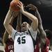 Matt Balkema(45) battles for a rebound as Eastern Michigan University took on Rochester College at the Convocation Center Wednesday November 23, 2011.EMU won the game 62-43. Jeff Sainlar I AnnArbor.com