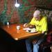 H.D. Brown enjoys a meal from the Cottage Inn. "It's great and just wonderful what they do," said Brown. "I enjoy it." The Original Cottage Inn on William St. has been providing free Thanksgiving Day dinner to the less fortunate for the past 28 years. The Cottage Inn staff teamed up with local volunteers to serve an expected 300 guests meals with Thanksgiving favorites like oven roasted turkey, mashed potatoes, gravy, stuffing, veggies, and dessert on Thursday November 24, 2011.Jeff Sainlar I AnnArbor.com