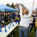 Tailgaters celebrate after winning a flip cup competition prior to the game as the University of Michigan took on Ohio State Saturday  November 26, 2011 at Michigan Stadium. Jeff Sainlar I AnnArbor.com