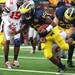 Denard Robinson falls into the endzone for his second rushing touchdown of the day as the University of Michigan took on Ohio State Saturday  November 26, 2011 at Michigan Stadium. Jeff Sainlar I AnnArbor.com