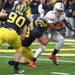 Ryan Van Bergen sacks Ohio State's Braxton Miller during the first half as the University of Michigan took on Ohio State Saturday  November 26, 2011 at Michigan Stadium. Jeff Sainlar I AnnArbor.com