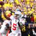 Braxton Miller fires a pass during the first half as the University of Michigan took on Ohio State Saturday  November 26, 2011 at Michigan Stadium. Michigan won the game 40-34. Miller threw for 235 yards, two touchdowns and one interception in the loss. Jeff Sainlar I AnnArbor.com