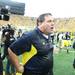 Michigan Head Coach Brady Hoke walks after being dumped with water jug as the University of Michigan took on Ohio State Saturday  November 26, 2011 at Michigan Stadium. Michigan won the game 40-34. Jeff Sainlar I AnnArbor.com