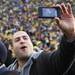Fans stormed the field and took photos as the University of Michigan took on Ohio State Saturday  November 26, 2011 at Michigan Stadium. Michigan won the game 40-34. Jeff Sainlar I AnnArbor.com