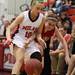 Milan's McKenzie Mitchell(left) fights for the ball with Brittney Emmett as Milan took on Whitmore Lake at Milan High School Tuesday November 29, 2011. Milan won the game 36-33.  Jeff Sainlar I AnnArbor.com