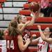 Whitmore's Melissa Dreffs struggles to force up a shot as Milan took on Whitmore Lake at Milan High School Tuesday November 29, 2011. Milan won the game 36-33.  Jeff Sainlar I AnnArbor.com