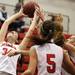 MIlan's Allison Sotomayor(left) grabs a rebound as Milan took on Whitmore Lake at Milan High School Tuesday November 29, 2011. Milan won the game 36-33.  Jeff Sainlar I AnnArbor.com