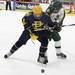 Huron's Drew Bonnee(right) and Max Corden battle for the puck as Ann Arbor Huron took on Grosse Pointe South  Wednesday November 30, 2011 at the Ann Arbor Ice Cube. Grosse Pointe South won 8-1. Jeff Sainlar I AnnArbor.com