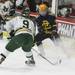 Huron's Patrick Gilchrist goes after Andrew Addy for the puck as Ann Arbor Huron took on Grosse Pointe South  Wednesday November 30, 2011 at the Ann Arbor Ice Cube. Grosse Pointe South won 8-1. Jeff Sainlar I AnnArbor.com