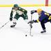 Huron's Nick Sorscher(left) tries to slow down Nolan Monforton's attack as Ann Arbor Huron took on Grosse Pointe South  Wednesday November 30, 2011 at the Ann Arbor Ice Cube. Grosse Pointe South won 8-1. Jeff Sainlar I AnnArbor.com