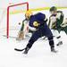 Grosse Pointe South's Max Corden gets a shot past the goalie for a goal as Ann Arbor Huron took on Grosse Pointe South  Wednesday November 30, 2011 at the Ann Arbor Ice Cube. Grosse Pointe South won 8-1. Jeff Sainlar I AnnArbor.com