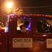 A child waves during the seventh annual Chelsea Light Parade took place down Main Street featuring dozens of lighted floats and vehicles, marching bands and Santa Claus. The parade started at Chelsea State Bank and ended at the Chelsea Teddy Bear Company Saturday  December 3, 2011. Jeff Sainlar I AnnArbor.com