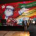 Joe Brown,8, and Caden Lakin,8, pose next to Santa's bus as Santa Claus' bus tour stopped in at the Macy's in Briarwood Mall Tuesday  December 6, 201. The purpose of the bus tour is to raise awareness of Macy's Believe campaign, which benefit?s Make-A-Wish.  Jeff Sainlar I AnnArbor.com