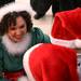 Santa's elf Nutmeg talks with a couple boys in line as Santa Claus' bus tour stopped in at the Macy's in Briarwood Mall Tuesday  December 6, 201. The purpose of the bus tour is to raise awareness of Macy's Believe campaign, which benefit?s Make-A-Wish.  Jeff Sainlar I AnnArbor.com