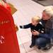 Colten,1, with mother Amber Drogowski sends off his letter to Santa as Santa Claus' bus tour stopped in at the Macy's in Briarwood Mall Tuesday  December 6, 201. Each letter written Macy's donates one dollar to the Make-A-Wish foundation.  The purpose of the bus tour is to raise awareness of Macy's Believe campaign, which benefit?s Make-A-Wish.  Jeff Sainlar I AnnArbor.com