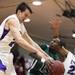 Pioneer's Nick Rakic(left) and Jibreel Hussein try to block Ashton Hundley as Ann Arbor Pioneer took on Father Gabriel Richard  Tuesday  December 6, 2011 at Pioneer High School. Pioneer won the game 70-34. Jeff Sainlar I AnnArbor.com