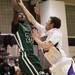 Evan Fosha shoots over Jimmy Holman as Ann Arbor Pioneer took on Father Gabriel Richard  Tuesday  December 6, 2011 at Pioneer High School. Pioneer won the game 70-34. Jeff Sainlar I AnnArbor.com