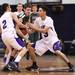 Pioneer's Nick Bertoia(left) and Giovanni Wasson harass a  Father Garbriel player for the ball as Ann Arbor Pioneer took on Father Gabriel Richard  Tuesday  December 6, 2011 at Pioneer High School. Pioneer won the game 70-34. Jeff Sainlar I AnnArbor.com