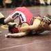 Manchester's Corey Johnson pins Milan's Chase Chitwood as Saline, Manchester, Clinton, and Milan participated in a quad meet Wednesday  December 7, 2011 at Manchester High School. Jeff Sainlar I AnnArbor.com