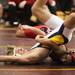 Saline's Taylor Galiais(left) tries to escape a Clinton wrestler's move as Saline, Manchester, Clinton, and Milan participated in a quad meet Wednesday  December 7, 2011 at Manchester High School. Jeff Sainlar I AnnArbor.com