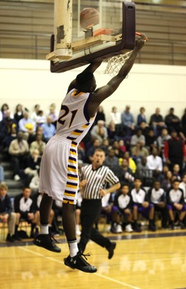 Ypsilanti's Mamadou Ba misses a break away dunk as Ann Arbor Pioneer took on Ypsilanti Friday December 9, 2011 at Ypsilanti High School. Ypsilanti won the game convincingly 70-38. Jeff Sainlar I AnnArbor.com