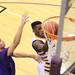 Ypsilanti's Xavier Higgins lays up past Gabe Isa as Ann Arbor Pioneer took on Ypsilanti Friday December 9, 2011 at Ypsilanti High School. Ypsilanti won the game convincingly 70-38. Jeff Sainlar I AnnArbor.com