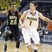 Stu Doglass looks to make a move as the Michigan men's basketball team took on Arkansas Pine-Bluff at the Crisler Arena Tuesday December 13, 2011. Michigan won the game. Jeff Sainlar I AnnArbor.com