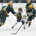 Chelsea's Joe Hewitt tries to break past defenders on the way to the goal as Chelsea High School took on Jackson Lumen Christi Wednesday December 14, 2011 at the Chelsea Arctic Coliseum. Chelsea won 6-5.  Jeff Sainlar I AnnArbor.com