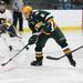 Jackson Lumen Christi's Austin Eccleton handles the puck as Chelsea High School took on Jackson Lumen Christi Wednesday December 14, 2011 at the Chelsea Arctic Coliseum. Chelsea won 6-5.  Jeff Sainlar I AnnArbor.com