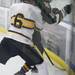 Chelsea's Cody Fojtik checks Blake Smith in to the wall as Chelsea High School took on Jackson Lumen Christi Wednesday December 14, 2011 at the Chelsea Arctic Coliseum. Chelsea won 6-5.  Jeff Sainlar I AnnArbor.com