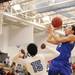 Lincoln's Scott Chatfield lays it up over Sakthi Sambandan as Skyline took on Ypsilanti Lincoln at Skyline High School Thursday December 15, 2011. Skyline won the game 54-51.  Jeff Sainlar I AnnArbor.com