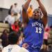 Lincoln's DeMarqus Washington pulls up for a jump shot in front of Theron Wilson as Skyline took on Ypsilanti Lincoln at Skyline High School Thursday December 15, 2011. Skyline won the game 54-51.  Jeff Sainlar I AnnArbor.com