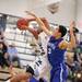 Skyline's Theron Wilson is fouled by Scott Chandler as Skyline took on Ypsilanti Lincoln at Skyline High School Thursday December 15, 2011. Skyline won the game 54-51.  Jeff Sainlar I AnnArbor.com