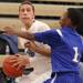 Skyline's Jack Clark takes the ball to the basket while Tyler Hinton defends as Skyline took on Ypsilanti Lincoln at Skyline High School Thursday December 15, 2011. Skyline won the game 54-51.  Jeff Sainlar I AnnArbor.com