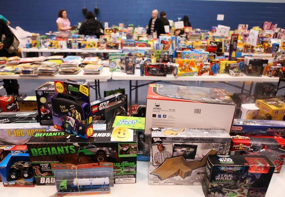 A vast number of toys are displayed for families to take home. Salvation Army didn't purchase any of the toys and they were all sponsored by people of Washtenaw County. The Salvation Army of Washtenaw County will put toys under the tree for local families in need at its annual Christmas Toy Shop. Families who signed up for Christmas assistance picked out toys for children, as well as a gift card to Meijers. An estimated over 550 families would be stopping in at the Salvation Army on Arbana Dr.  Friday December 16, 2011. Volunteers from all around Washtenaw County came to help the cause. Jeff Sainlar I AnnArbor.com