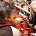Maddie Maynard,11, does her part in helping volunteer as the Salvation Army of Washtenaw County will put toys under the tree for local families in need at its annual Christmas Toy Shop. Families who signed up for Christmas assistance picked out toys for children, as well as a gift card to Meijers. An estimated over 550 families would be stopping in at the Salvation Army on Arbana Dr.  Friday December 16, 2011. Volunteers from all around Washtenaw County came to help the cause. Jeff Sainlar I AnnArbor.com