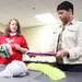 Wendi Smith, left, and Sheila Roby help organize clothes to pass out to families as the Salvation Army of Washtenaw County will put toys under the tree for local families in need at its annual Christmas Toy Shop. Families who signed up for Christmas assistance picked out toys for children, as well as a gift card to Meijers. An estimated over 550 families would be stopping in at the Salvation Army on Arbana Dr.  Friday December 16, 2011. Volunteers from all around Washtenaw County came to help the cause. Jeff Sainlar I AnnArbor.com