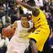 Huron's Mike Lewis drives towards the basket as Ann Arbor Huron took on Ypsilanti  at Huron High School Friday December 16, 2011. Ypsilanti won the game 66-57. Jeff Sainlar I AnnArbor.com