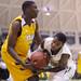 Lavonte Davis(left) and Kendall Thomas fight for possession of the ball as Ann Arbor Huron took on Ypsilanti  at Huron High School Friday December 16, 2011. Ypsilanti won the game 66-57. Jeff Sainlar I AnnArbor.com