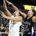 Michigan's Carmen Reynolds lays it off the glass despite Jessica Valley's defense as Michigan women's basketball team took on Indiana St Saturday December 17, 2011. Michigan won the game 72-44. Jeff Sainlar I AnnArbor.com