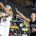 Michigan's Jenny Ryan evades defender Racheal Mahan for a layup as Michigan women's basketball team took on Indiana St Saturday December 17, 2011. Michigan won the game 72-44. Jeff Sainlar I AnnArbor.com