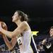 Michigan's Kate Thompson spots up for a three-point shot in front of Indiana State head coach Teri Moren as Michigan women's basketball team took on Indiana St Saturday December 17, 2011. Michigan won the game 72-44. Jeff Sainlar I AnnArbor.com