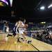 Michigan's Carmen Reynolds saves a loose ball from going out of bounds as Michigan women's basketball team took on Indiana St Saturday December 17, 2011. Michigan won the game 72-44. Jeff Sainlar I AnnArbor.com