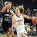 Michigan's Courtney Boylan drives past Deja Mattox as Michigan women's basketball team took on Indiana St Saturday December 17, 2011. Michigan won the game 72-44. Jeff Sainlar I AnnArbor.com