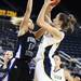 Michigan's Kate Thompson takes it up strong against Deja Mattox as Michigan women's basketball team took on Indiana St Saturday December 17, 2011. Michigan won the game 72-44. Jeff Sainlar I AnnArbor.com
