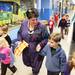 Kathleen Wright(center) walks with her kindergarten class throughout the school during a gingerbread man hunt at Lakewood Elementary School December 21, 2011. Certain schools throughout Washtenaw County are starting all-day kindergarten classes. Lakewood has an extended day option. Jeff Sainlar I AnnArbor.com