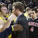 Zack Novak has words with John Beilein's son Patrick Beilein, who is director of operations at Bradley as the Michigan men's basketball team took on Bradley at Crisler Arena Thursday December 22, 2011. Michigan won the game 77-66. Jeff Sainlar I AnnArbor.com